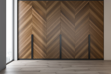 Interior of empty loft living room with white walls, wooden floor and built in wardrobe. Concept of interior design and comfortable apartment. 3d renderingの写真素材