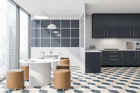 Interior of stylish kitchen with white walls, black countertops and cupboards with built in sink and cooker and two round tables with leather chairs. 3d renderingの写真素材