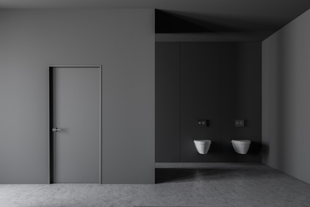 Interior of modern bathroom with dark gray walls, concrete floor, two toilets and gray door in the wall. 3d renderingの写真素材