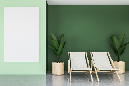 Interior of minimalistic living room with green walls, concrete floor, two armchairs and vertical mock up poster on the wall. 3d renderingの写真素材