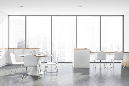 Interior of panoramic kitchen with concrete floor, white countertops with built in sink and two tables with chairs. 3d renderingの写真素材