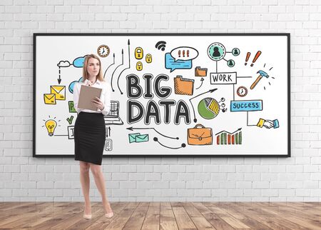 Pensive blonde businesswoman with notebook standing near colorful big data sketch drawn on whiteboard. Concept of hi tech and educationの写真素材