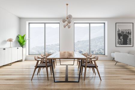 Side view of stylish dining room with white walls, wooden floor, large windows, long wooden table with gray chairs and white cabinet. Poster with city on the wall. 3d renderingの写真素材