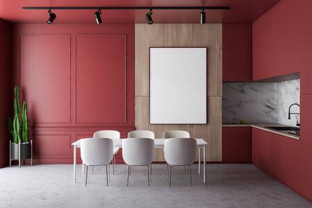 Interior of stylish kitchen with red, marble and wooden walls, concrete floor, red countertops with...