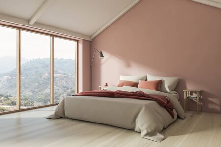 Corner of stylish attic bedroom with pink walls, wooden floor, large window and double bed with two bedside tables and floor lamp. 3d renderingの写真素材