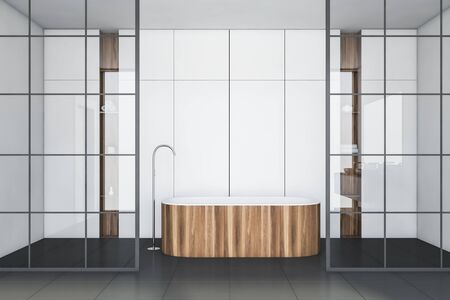 Interior of loft bathroom with white and glass walls, gray tiled floor and comfortable wooden bathtub. 3d renderingの写真素材