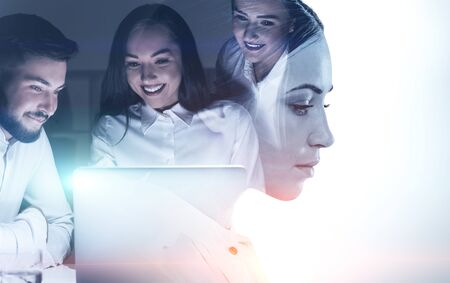 Side view of serious young businesswoman with double exposure of her happy employees working in...