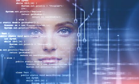 Beautiful young woman with dark hair looking forward with double exposure of lines of code. Concept...