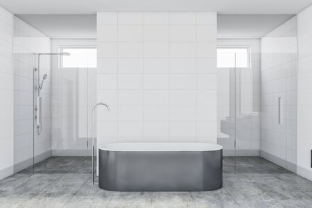 Interior of luxury bathroom with white tile walls, concrete floor, comfortable gray bathtub and shower stall with glass doors. 3d renderingの写真素材