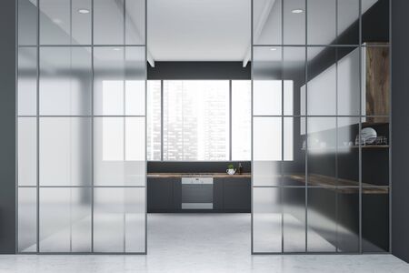 Interior of stylish kitchen with gray walls, panoramic window, gray countertops, white cupboards and glass doors. 3d renderingの写真素材