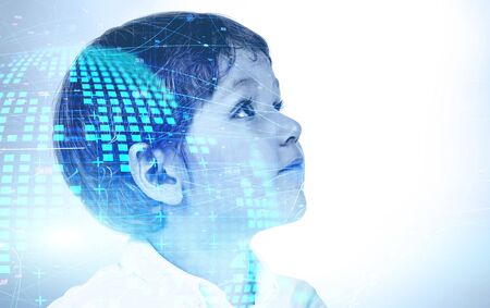 Portrait of adorable smart little boy in white shirt looking up with double exposure of digital planet hologram. Concept of internet in education and hi tech. Toned image mock upの写真素材