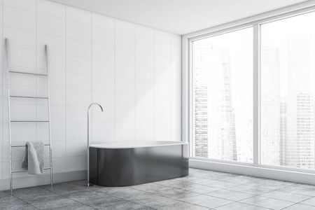 Corner of panoramic bathroom with white tile walls, gray tiled floor, comfortable gray bathtub and metal ladder with towel on it. 3d renderingの写真素材