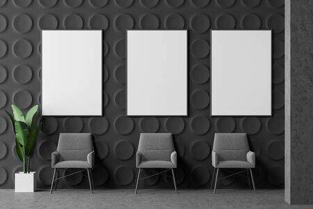 Row of comfortable gray armchairs in modern office lounge area with dark gray geometric pattern walls and concrete floor. Vertical mock up poster gallery. 3d renderingの写真素材
