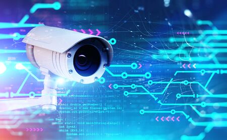Modern CCTV camera with double exposure of circuit interface, network and lines of code. Concept of...