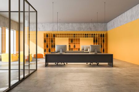 Interior of modern open space office in loft style with yellow and concrete walls, long gray...