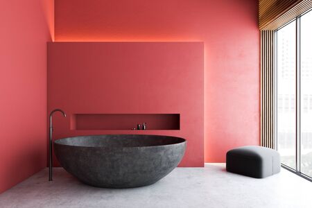 Interior of modern bathroom with red walls, concrete floor, round stone bathtub and armchair in the corner. Concept of spa. 3d renderingの写真素材