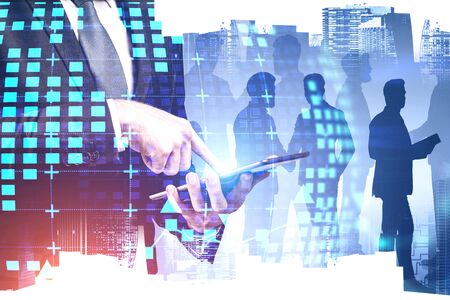 Unrecognizable businessman using tablet in city with business people in background and double...