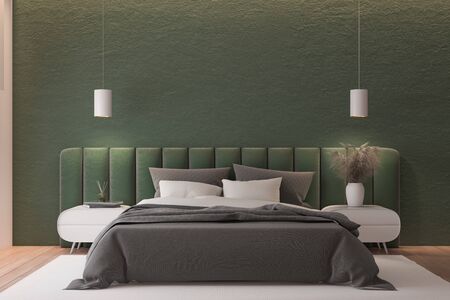 Interior of master bedroom with green and pink walls, wooden floor, green king size bed standing on white carpet and two bedside tables. 3d renderingの写真素材