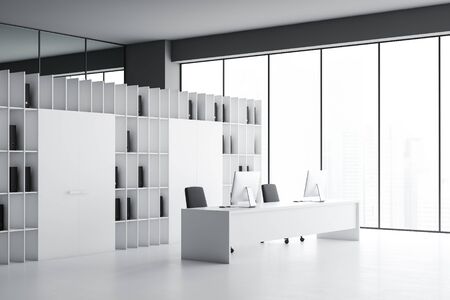 Corner of modern open space office with gray walls, concrete floor, long white computer table and bookcase with folders. 3d renderingの写真素材