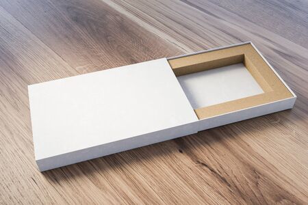 Open narrow white gift box lying on wooden table. Concept of holidays and celebration. 3d renderingの写真素材