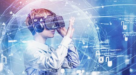 Young businesswoman in VR glasses working with immersive cyber security interface with double...
