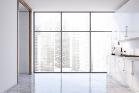 Interior of panoramic kitchen with white walls, concrete floor, white cupboards and countertops with built in cooker and window with cityscape. 3d renderingの写真素材