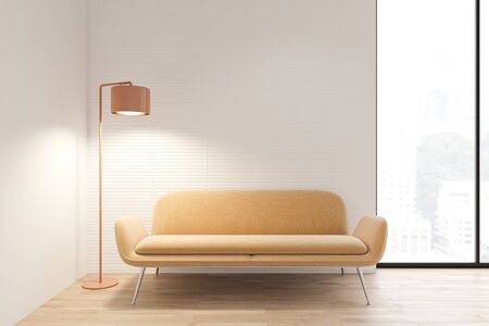 Interior of minimalistic living room with white walls, wooden floor, comfortable yellow sofa and stylish floor lamp. Window with cityscape. 3d renderingの写真素材