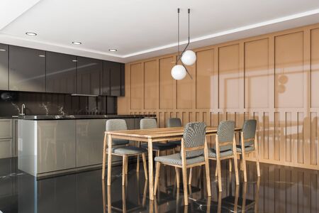 Corner of stylish kitchen with black marble and beige walls, black marble floor, grey countertops...