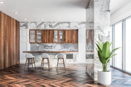 Interior of luxury kitchen with gray marble and wooden walls, wooden floor, marble countertops,...