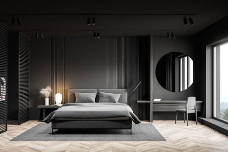 Interior of luxury master bedroom with grey and dark wooden walls, wooden floor, comfortable king size bed and makeup table with round mirror above it. 3d renderingの写真素材