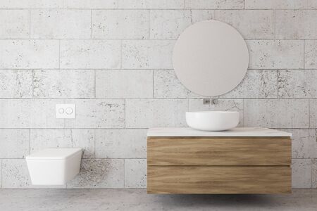 Interior of spacious bathroom with stone tile walls, concrete floor, round sink standing on wooden...