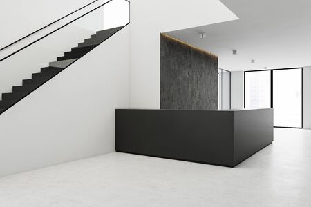 Black minimalistic reception counter in spacious office hall with white walls, concrete floor,...
