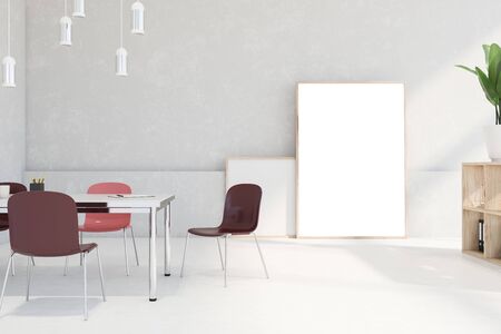 Interior of loft meeting room with white walls and floor, big table with red chairs, wooden bookshelves with folders and vertical mock up poster standing on the floor. 3d renderingの写真素材