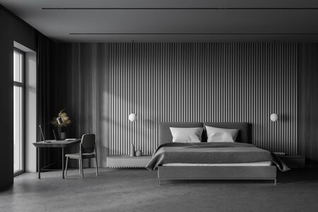 Interior of stylish master bedroom in Scandinavian style with grey and wooden walls, concrete floor, comfortable king size bed and home office area. 3d renderingの写真素材