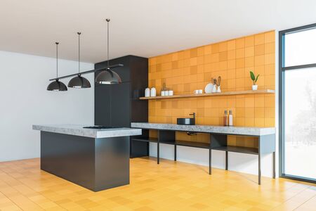 Corner of modern kitchen with yellow tiled walls and floor, black cupboard and island and stone countertops with sink. Window with blurry scenery. 3d renderingの写真素材