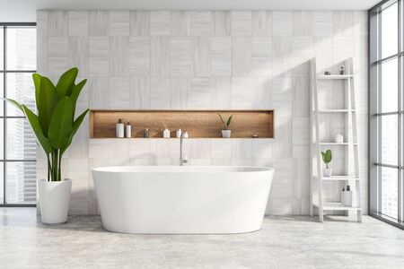 Interior of modern bathroom with white wooden walls, concrete floor, comfortable bathtub with niche...