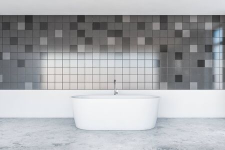 Interior of stylish minimalistic bathroom with grey tiled and white walls, concrete floor and comfortable bathtub. 3d renderingの写真素材