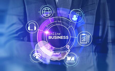 Blurry unrecognizable businessman holding smartphone with double exposure of creative futuristic immersive hud online business interface. Toned imageの写真素材