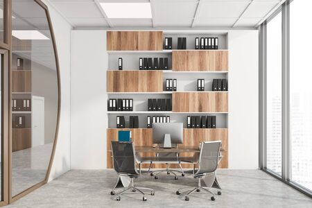 Interior of futuristic office with white and brown walls, concrete floor, CEO computer desk and...