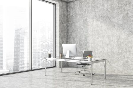 Corner of minimalistic loft style CEO office with concrete walls and floor, window with blurry cityscape and glass computer table. 3d renderingの写真素材