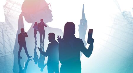 Silhouettes of business people video chatting and talking on phones in abstract blurry city. Concept...