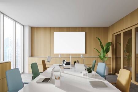 Interior of panoramic open space office with white and wooden walls, concrete floor, long table with...