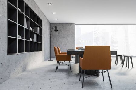 Interior of loft office library with stone walls and floor, black bookcase and long wooden table...