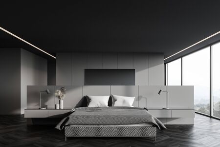 Interior of stylish panoramic master bedroom with gray walls, wooden floor, comfortable king size bed, panoramic window with blurry mountain view and mirror. 3d renderingの写真素材