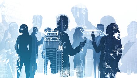 Communication concept. Silhouettes of diverse business people working together in abstract city with double exposure of blurry cityscape. Toned imageの写真素材