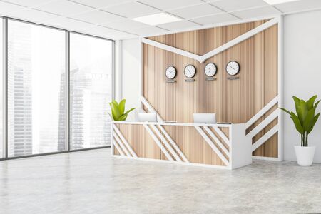 Corner of stylish international company office waiting room with white and wooden walls, concrete floor, comfortable reception desk and blurry cityscape. Clocks showing world time. 3d renderingの写真素材