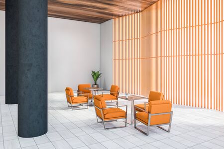 Corner of stylish office waiting room with white and orange walls, wooden tiled floor, comfortable...