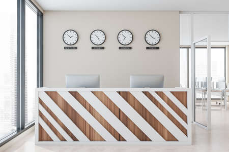 White and wooden reception desk standing in modern office with beige walls, concrete floor and...