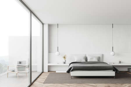 Interior of modern bedroom with white walls, wooden floor, comfortable king size bed with two bedside tables and balcony with blurry mountain scenery. 3d renderingの写真素材
