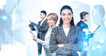Portraits of four diverse business people working together in Moscow city with double exposure of...